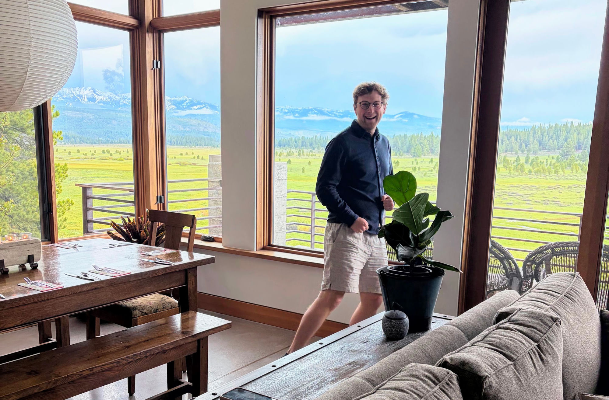 Dancing in a Tahoe cabin with mountain views out the windows