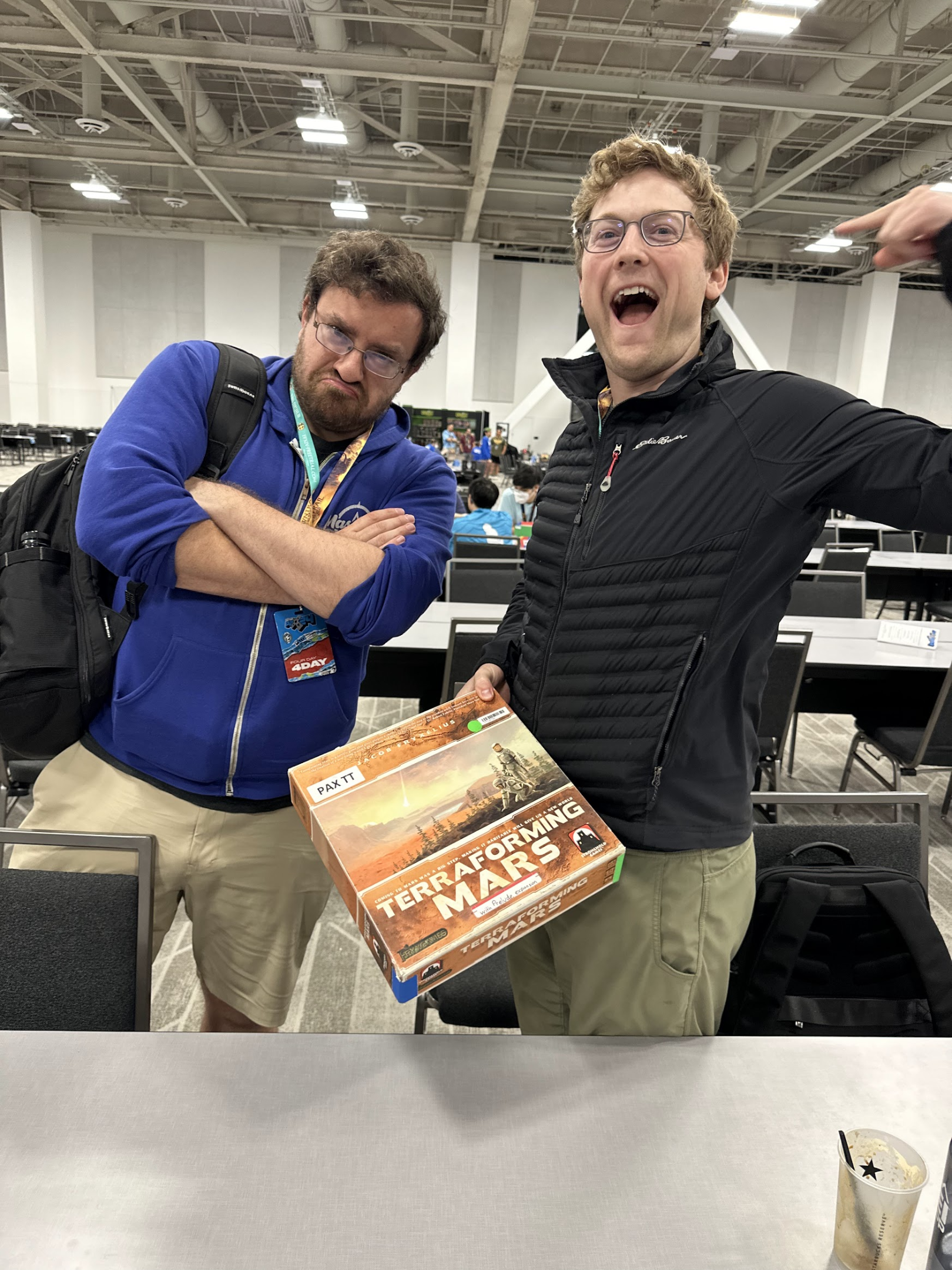Grinning while holding Terraforming Mars as Ben pouts